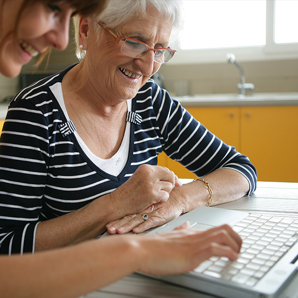 senior woman using laptop