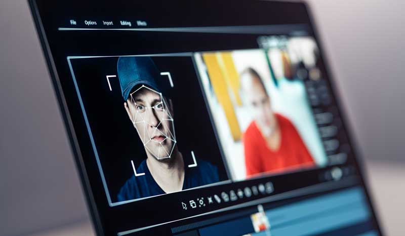 Photo showing production expert using AI to edit a digital marketing video