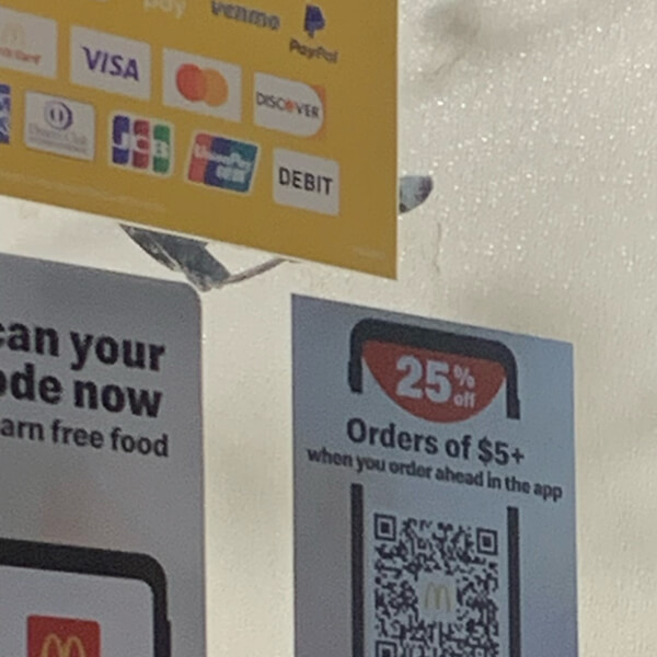 Example in McDonalds window of a qr code for marketing